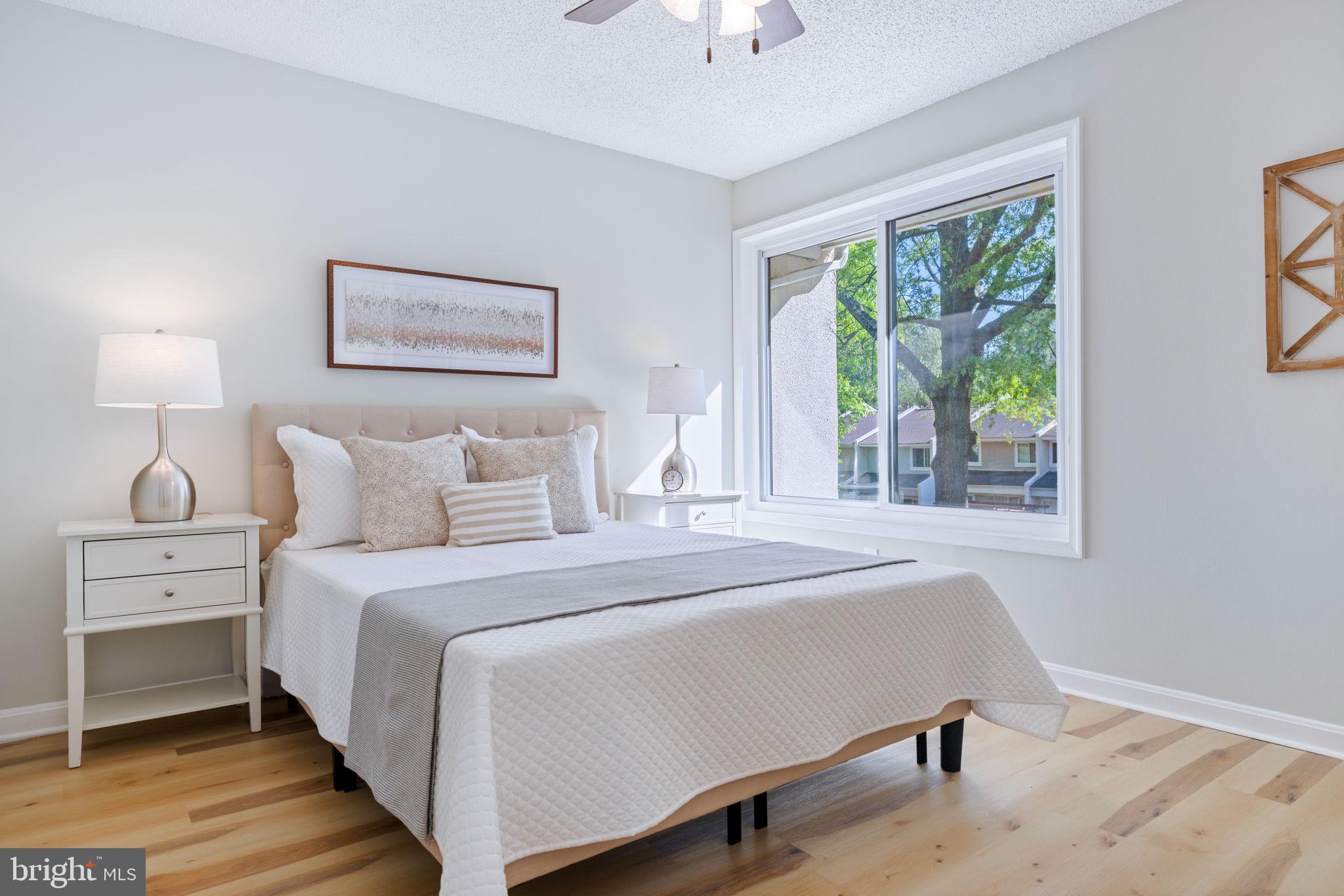 2389 Southgate Square Reston, VA 20191 - Photo 34 of 56 a bedroom with a bed and a window