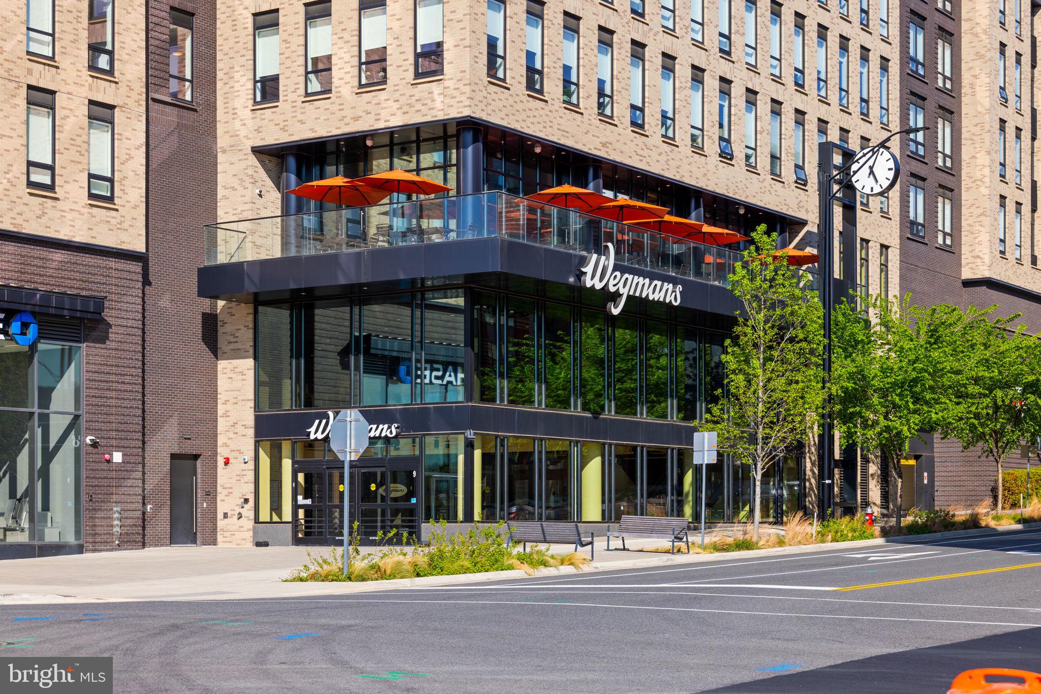 2389 Southgate Square Reston, VA 20191 - Photo 48 of 56 a view of a building with a umbrellas on a street