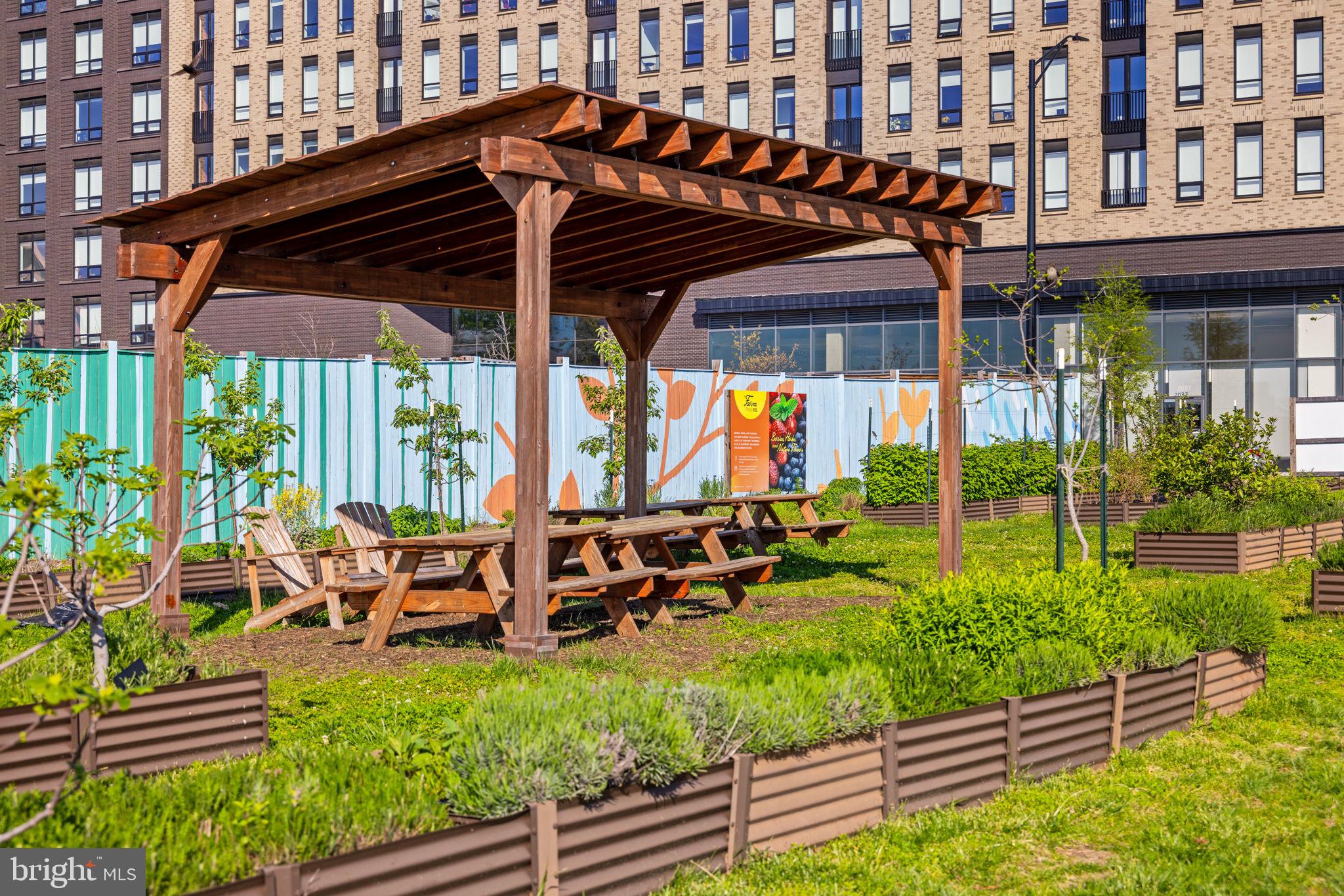 2389 Southgate Square Reston, VA 20191 - Photo 55 of 56 a view of a chair and tables in the patio in front of a house