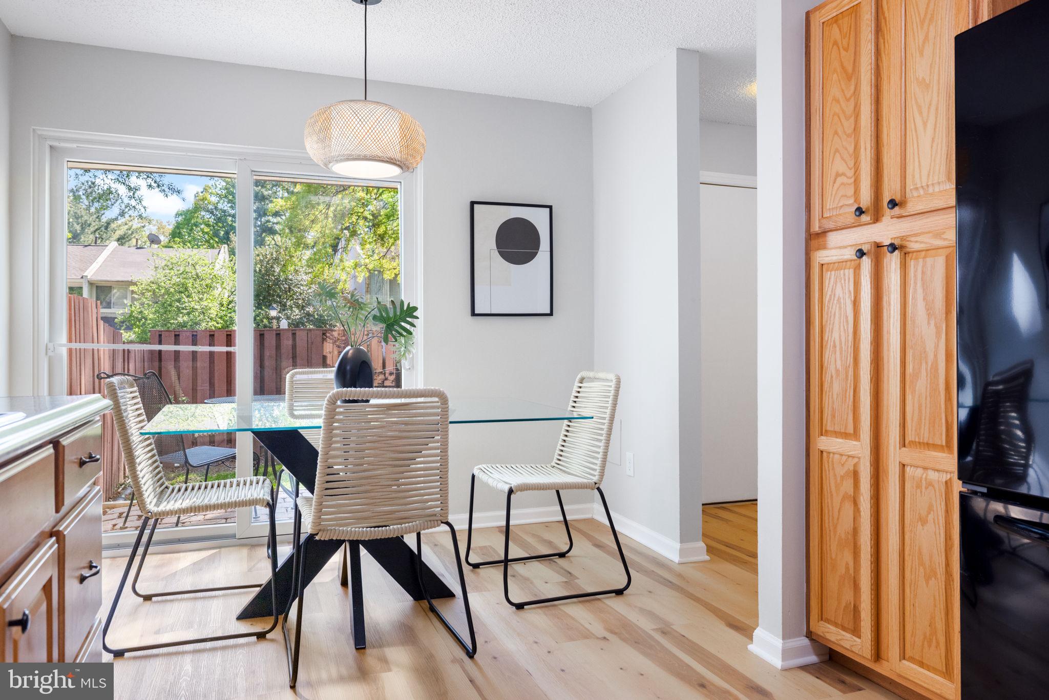2389 Southgate Square Reston, VA 20191 - Photo 10 of 56 a view of a dining room with furniture window and outside view