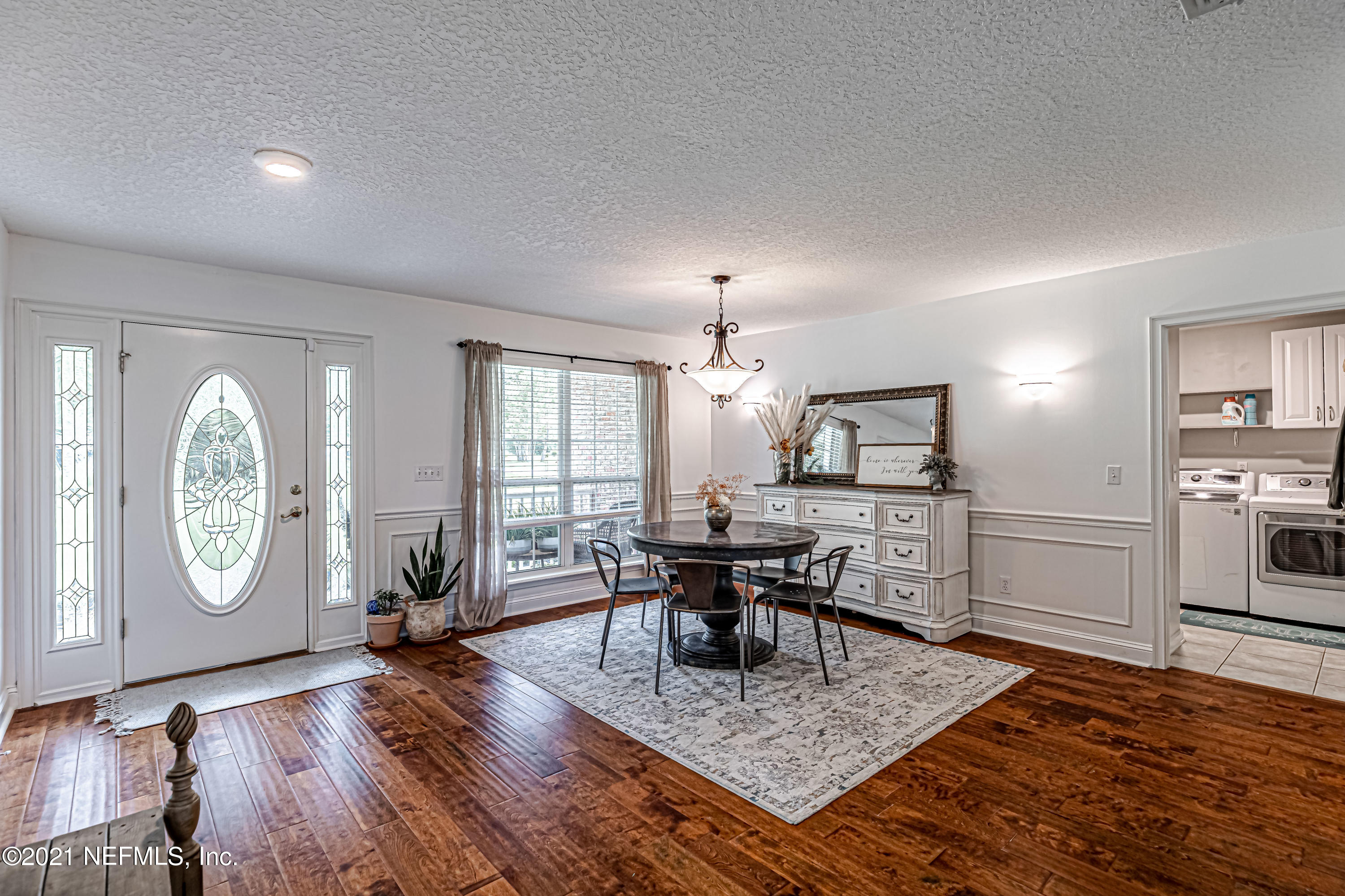 184 Circuit Rider Road Green Cove Springs, FL 32043 - Photo 12 of 58 a view of a livingroom with furniture window and wooden floor