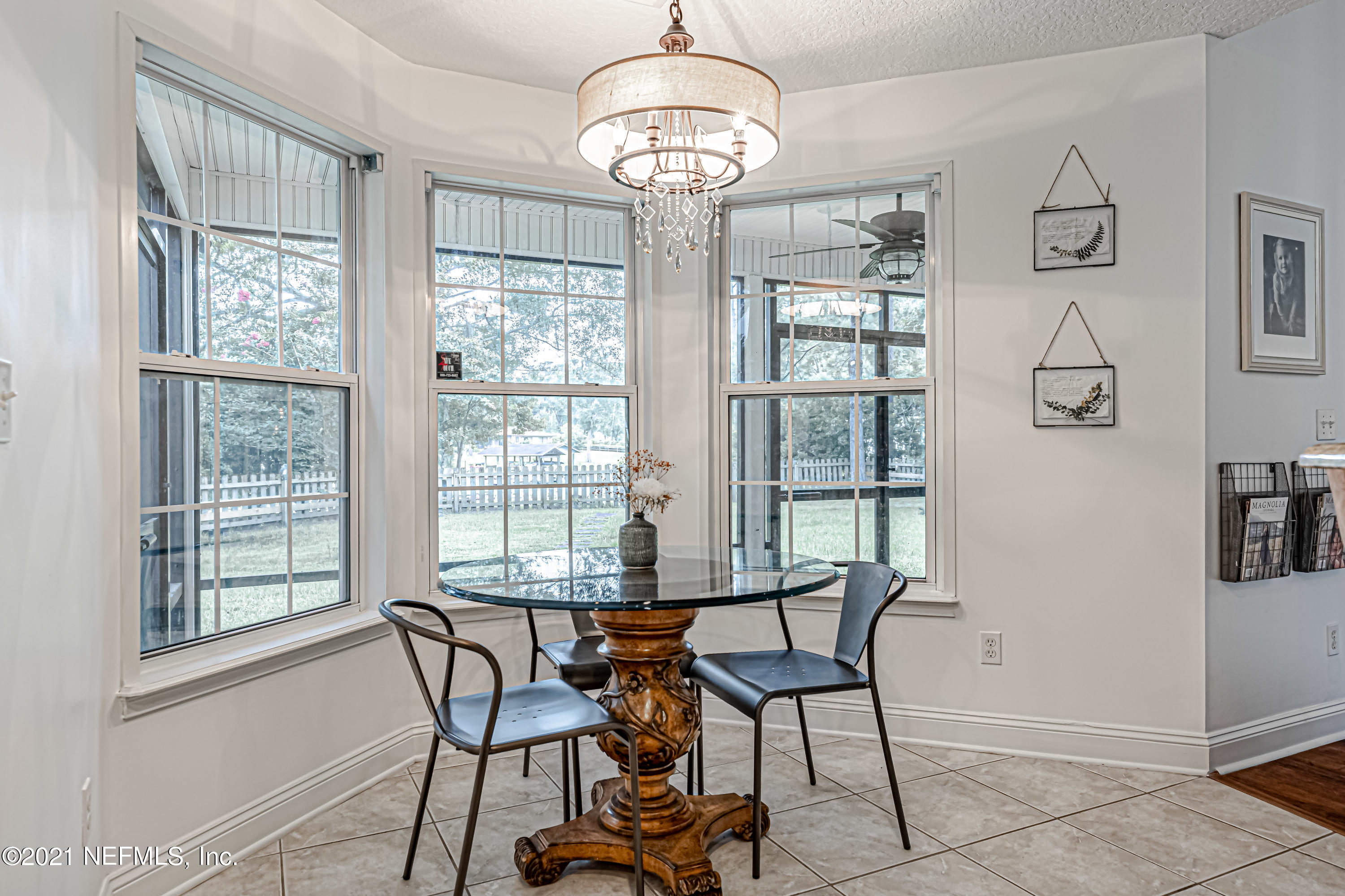 184 Circuit Rider Road Green Cove Springs, FL 32043 - Photo 21 of 58 a view of a dining room with furniture window and outside view