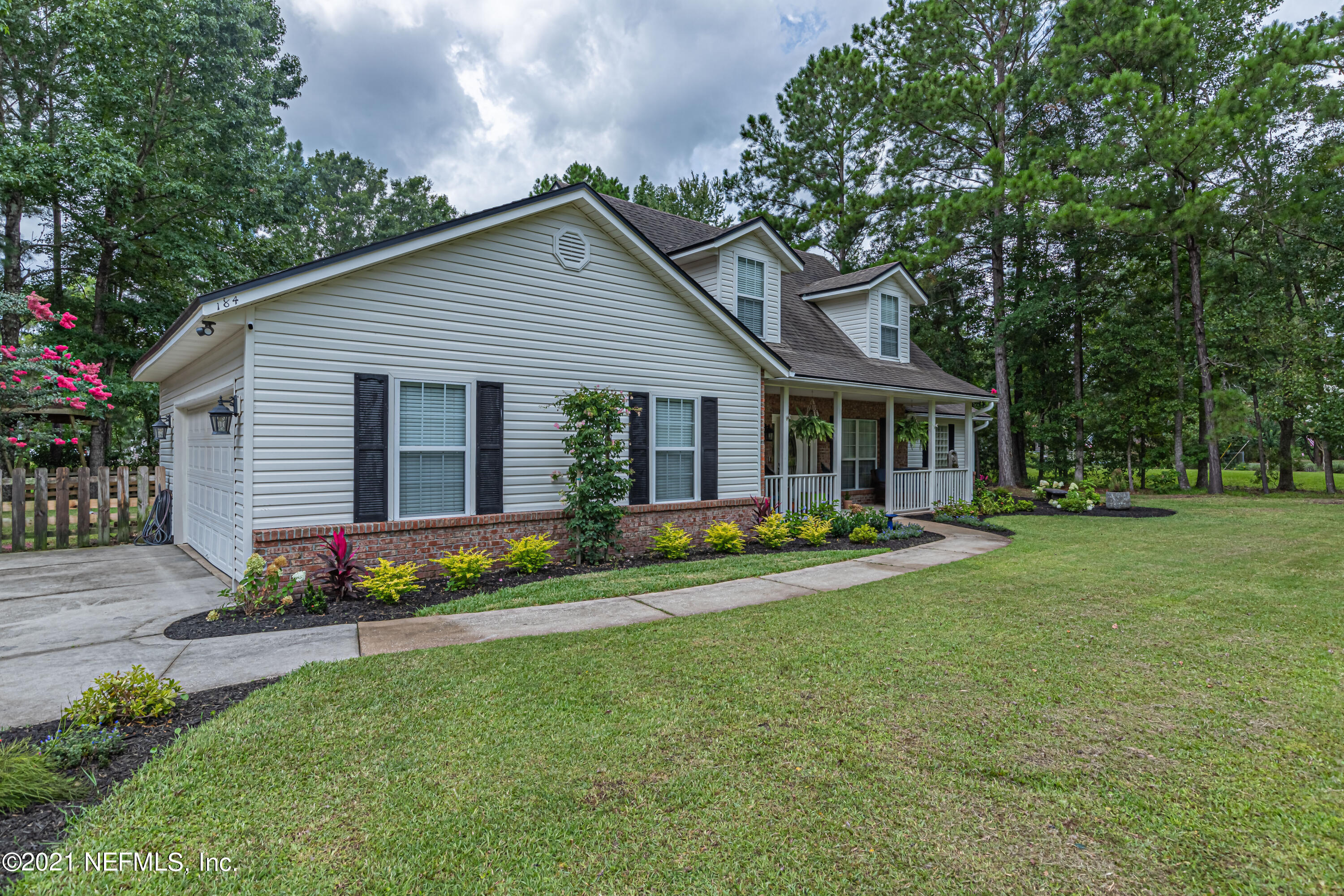 184 Circuit Rider Road Green Cove Springs, FL 32043 - Photo 3 of 58 a front view of house with yard and green space