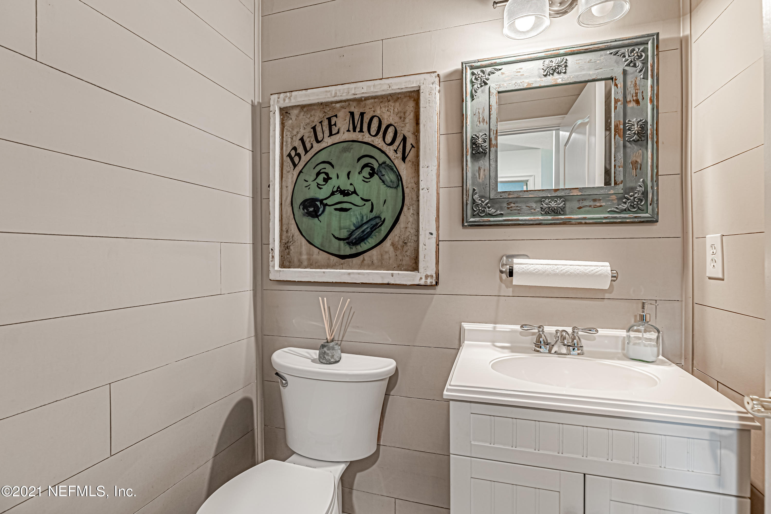 184 Circuit Rider Road Green Cove Springs, FL 32043 - Photo 36 of 58 a bathroom with a toilet sink and mirror