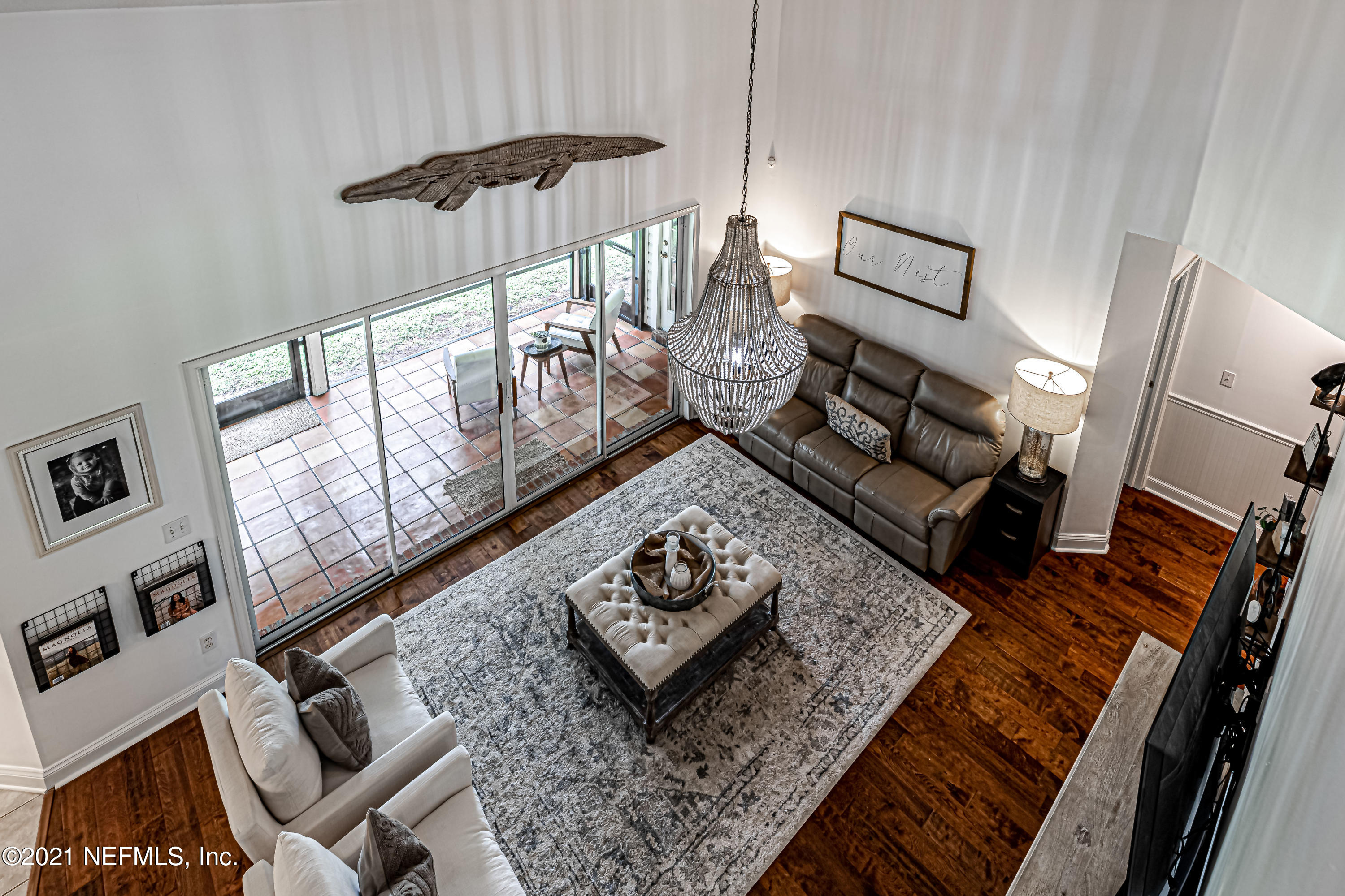184 Circuit Rider Road Green Cove Springs, FL 32043 - Photo 37 of 58 a living room with furniture and a flat screen tv