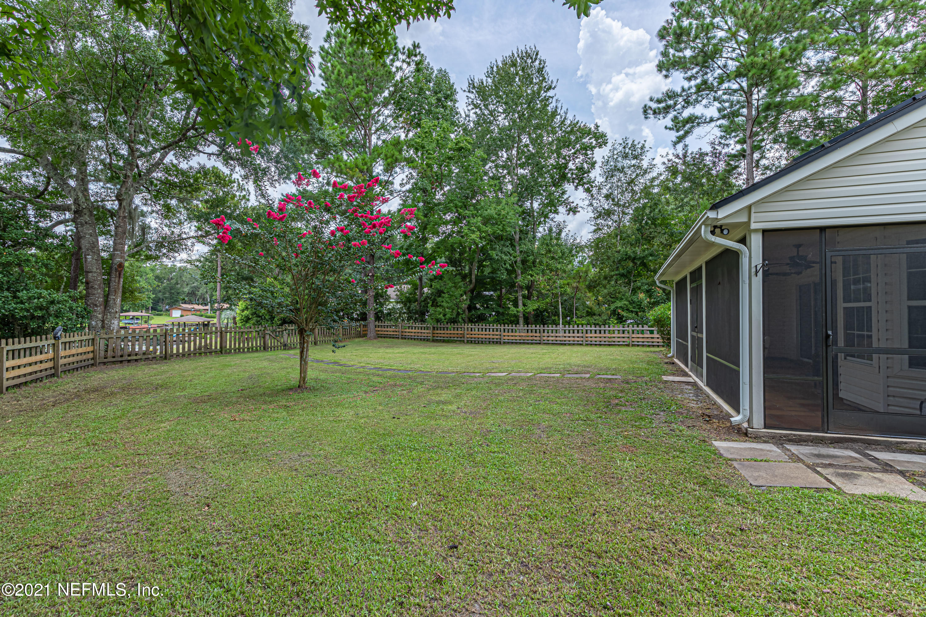 184 Circuit Rider Road Green Cove Springs, FL 32043 - Photo 45 of 58 a view of a tree in front of a house