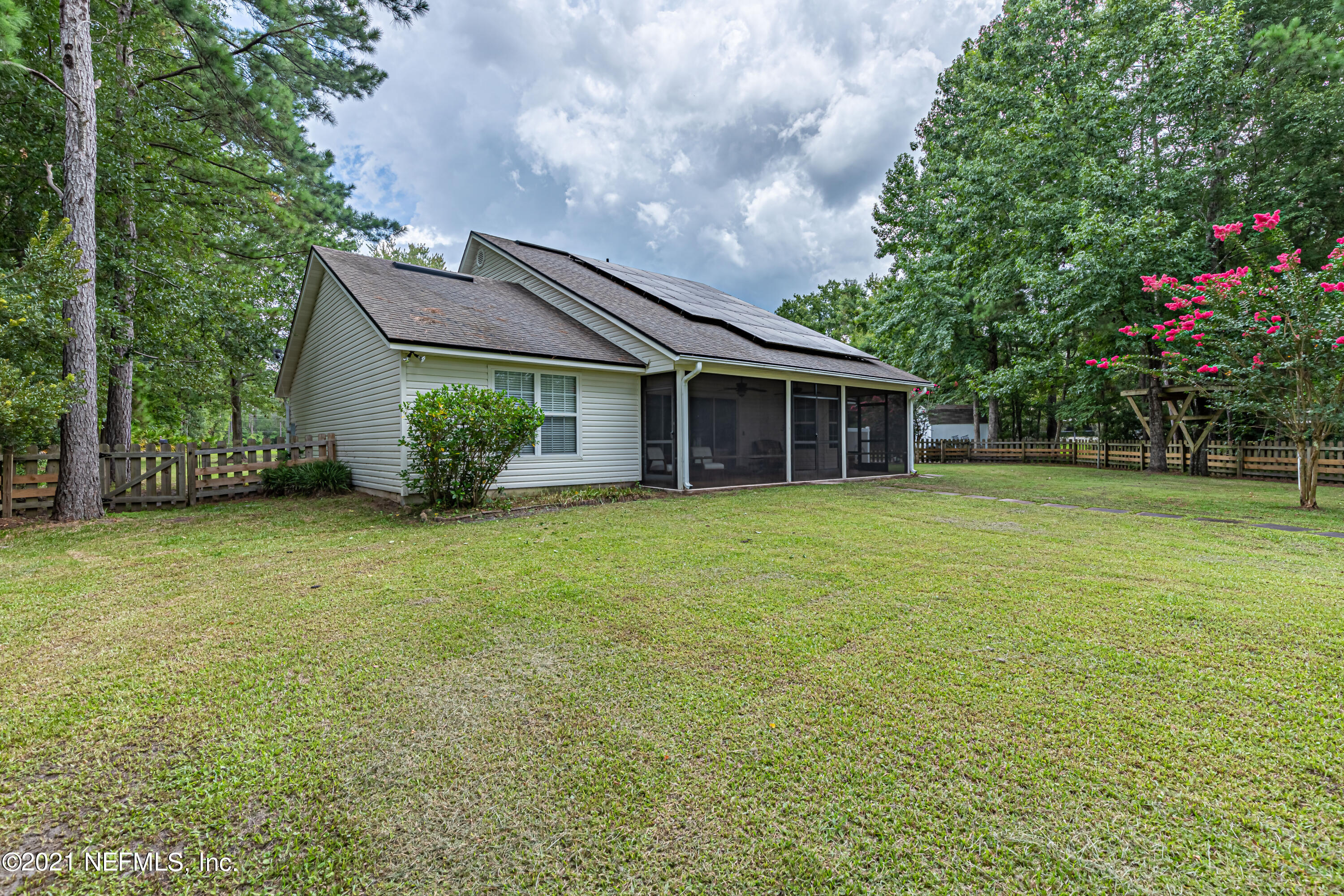 184 Circuit Rider Road Green Cove Springs, FL 32043 - Photo 46 of 58 a front view of house with an outdoor space and garden