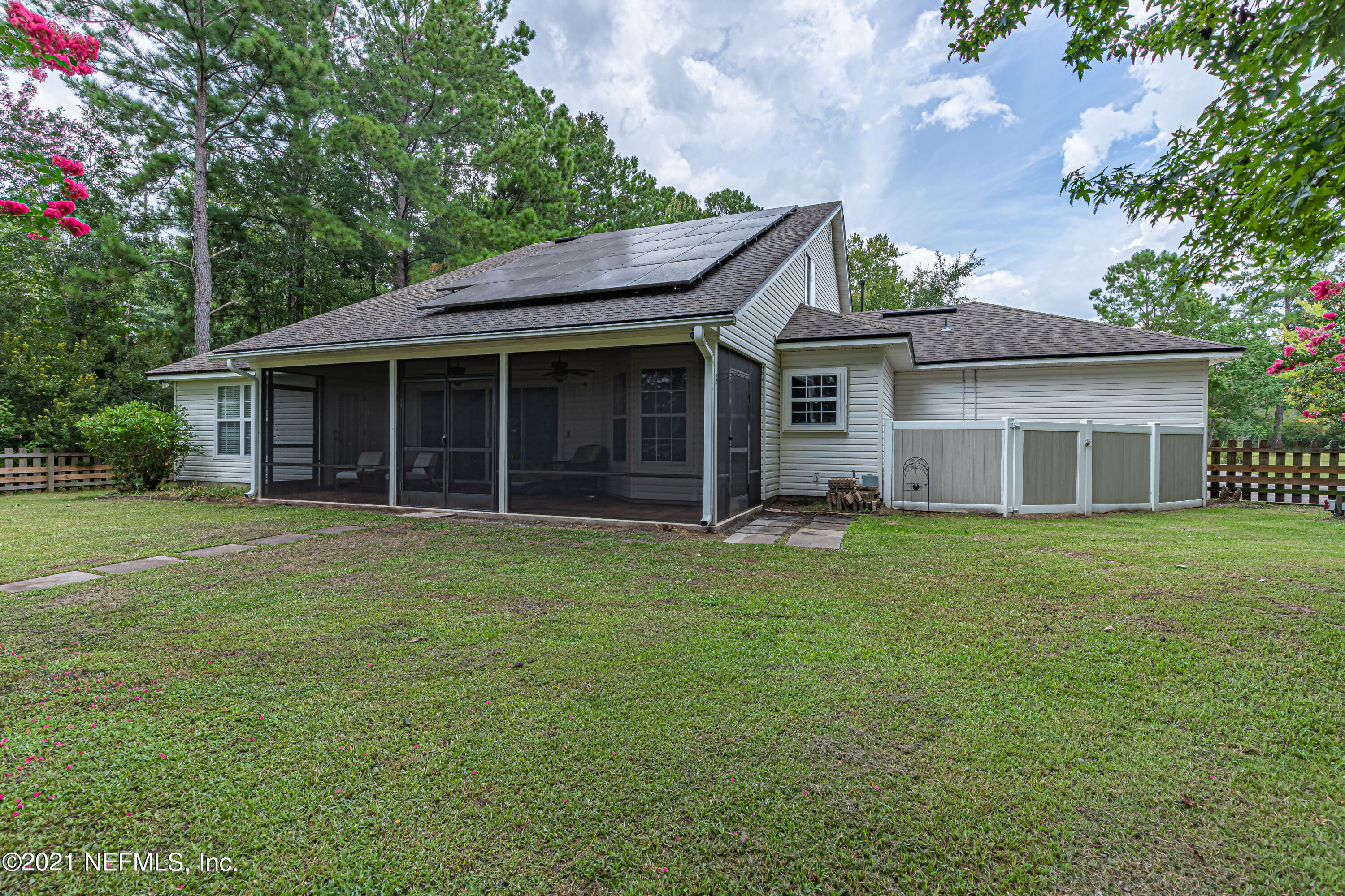 184 Circuit Rider Road Green Cove Springs, FL 32043 - Photo 48 of 58 a view of a house with a garden