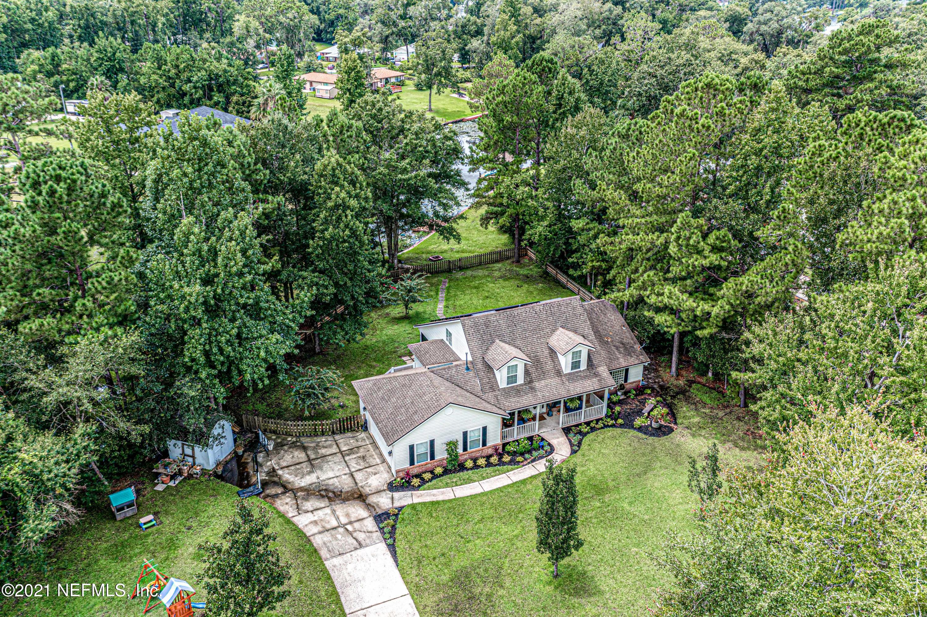 184 Circuit Rider Road Green Cove Springs, FL 32043 - Photo 51 of 58 an aerial view of a house with yard swimming pool and outdoor seating