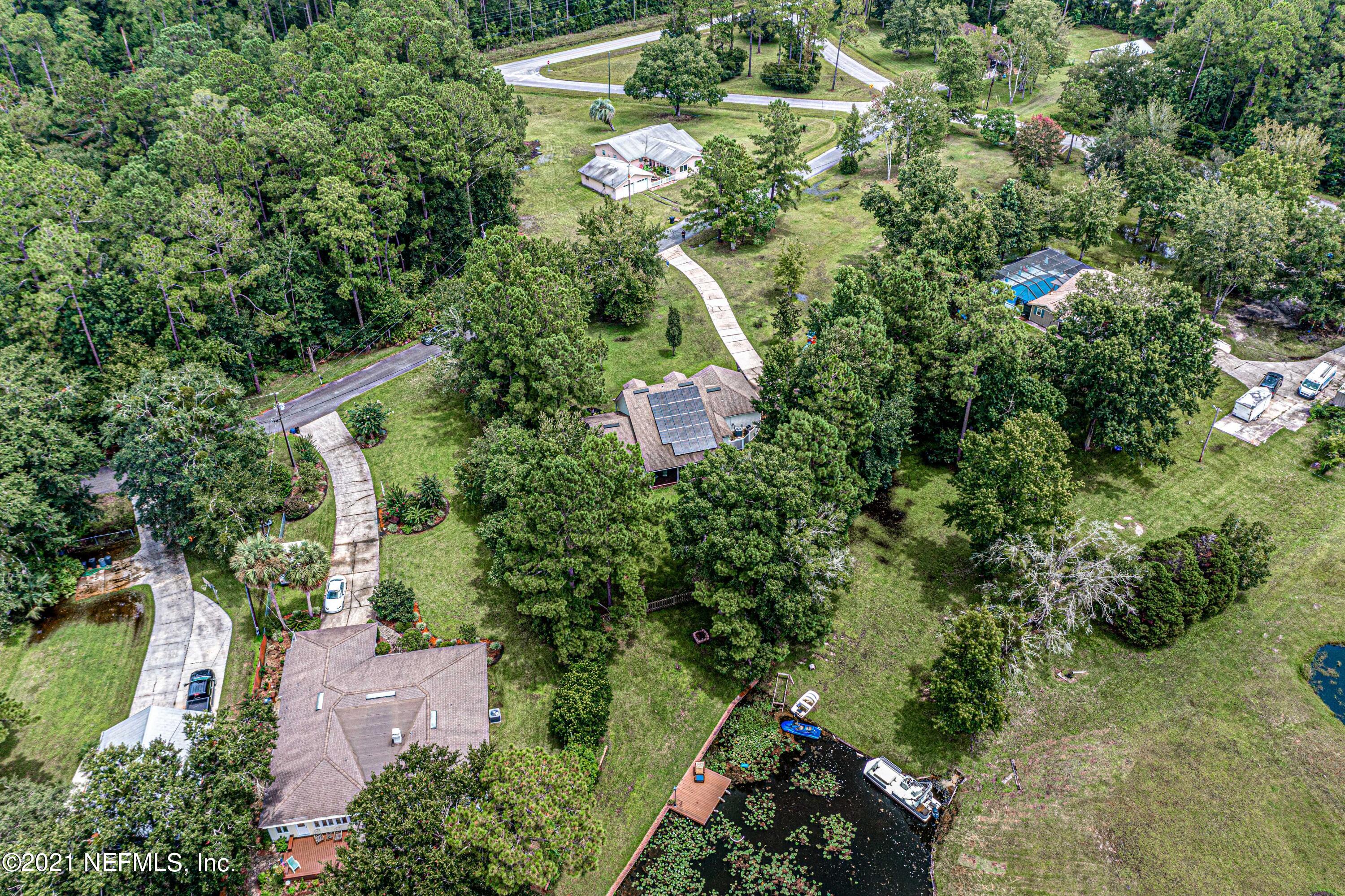 184 Circuit Rider Road Green Cove Springs, FL 32043 - Photo 57 of 58 an aerial view of a house with a yard