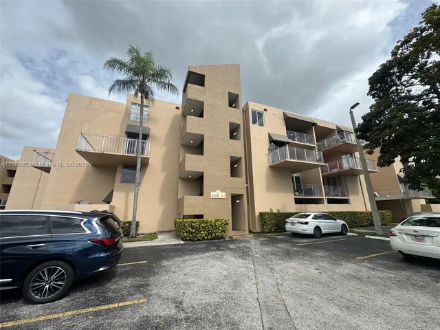 a car parked in front of a house