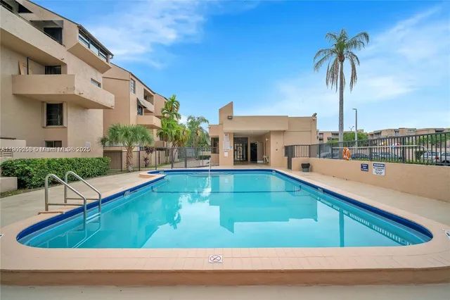 a view of a house with swimming pool