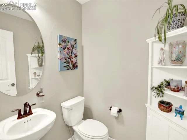 a work room with furniture and a window