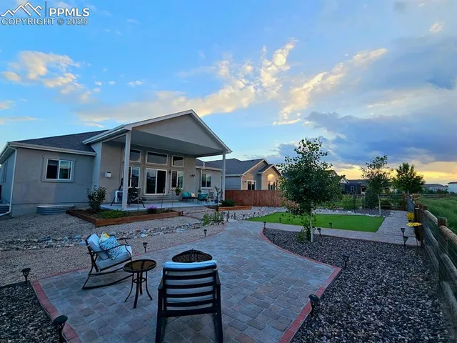 a view of a city from a balcony with outdoor space