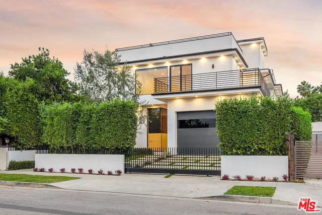 front view of a house with a street