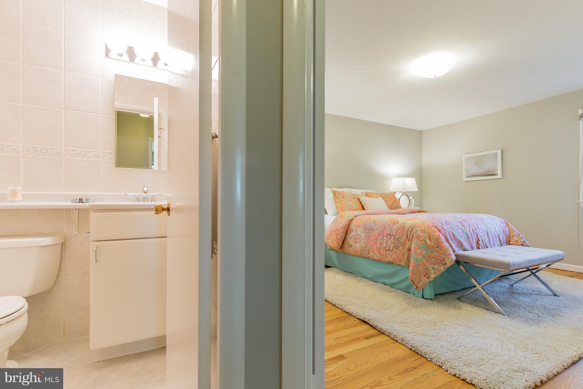 8620 Rayburn Road Bethesda, MD 20817 - Photo 22 of 29 Hall bath and master bedroom