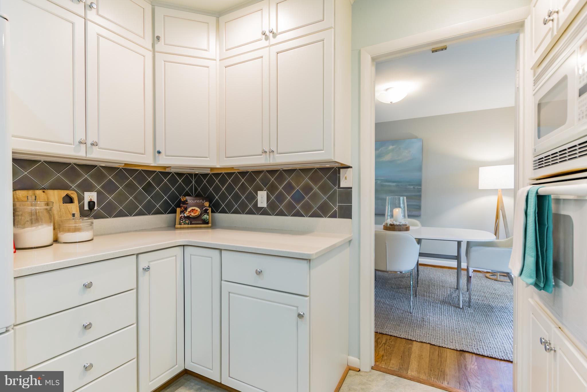 8620 Rayburn Road Bethesda, MD 20817 - Photo 9 of 29 Renovated kitchen with tile backsplash