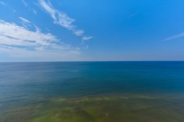 a view of an ocean from a balcony