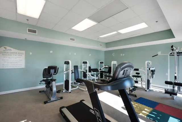 a view of a swimming pool with seating area