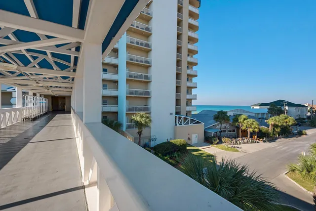 a view of a swimming pool with outdoor seating