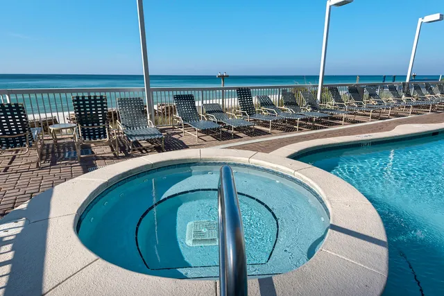 a view of a balcony with chairs