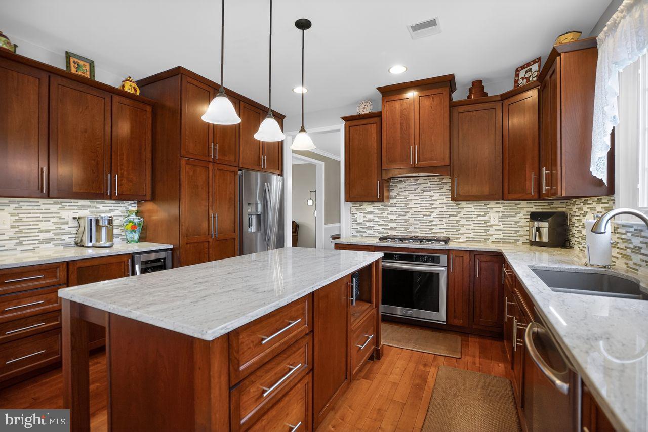 1990 Knight Road Green Lane, PA 18054 - Photo 3 of 28 Modern kitchen with rich wood tones.