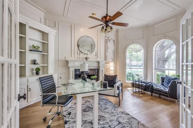a view of a livingroom with furniture and a window