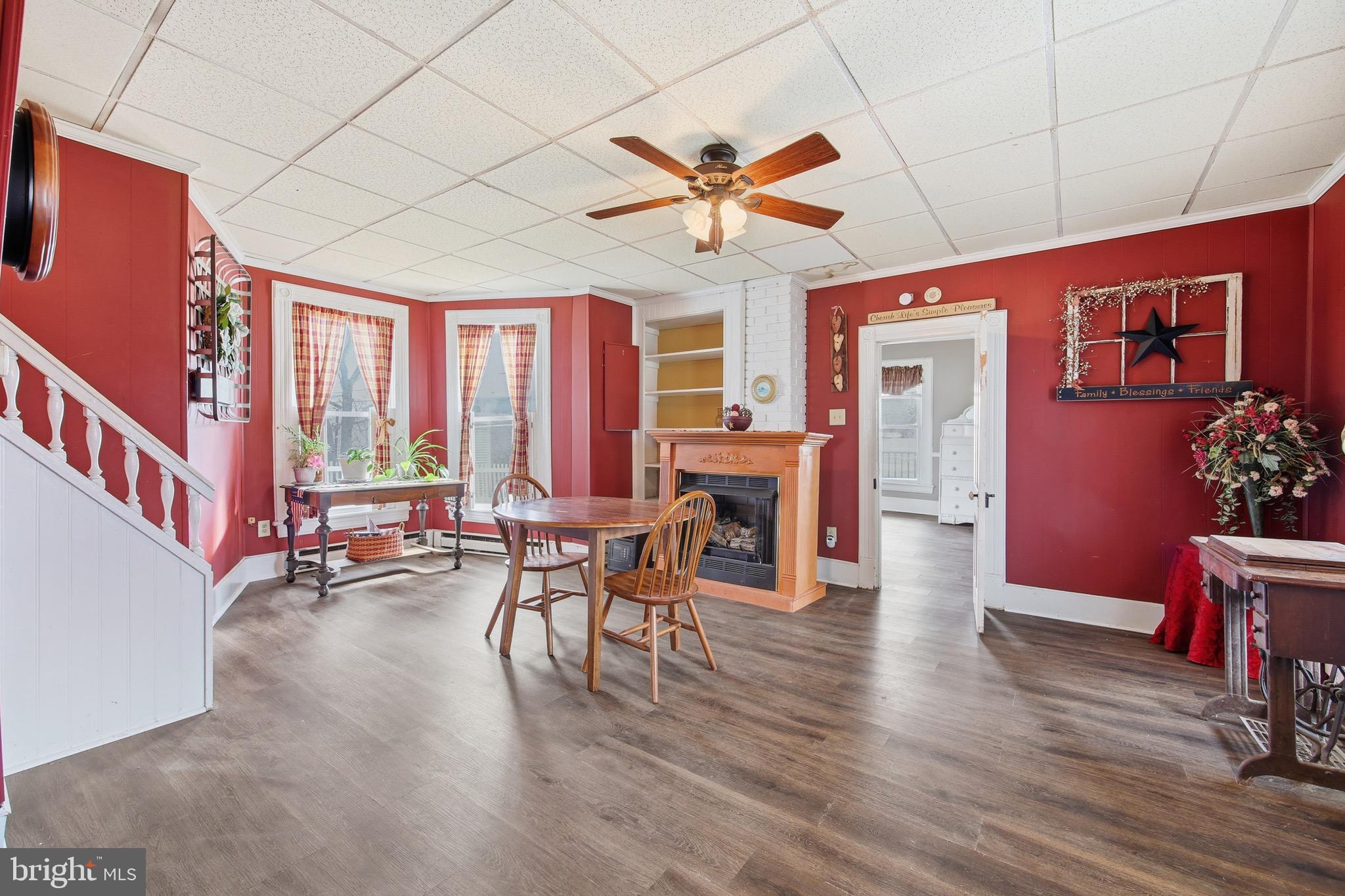 24295 Senedo Road Woodstock, VA 22664 - Photo 17 of 43 a view of a livingroom with furniture window and wooden floor