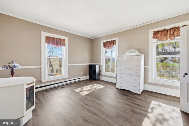 a view of livingroom with furniture and window