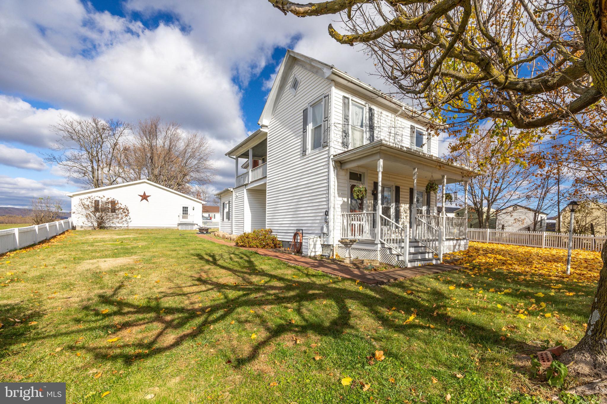 24295 Senedo Road Woodstock, VA 22664 - Photo 2 of 43 a front view of house with yard