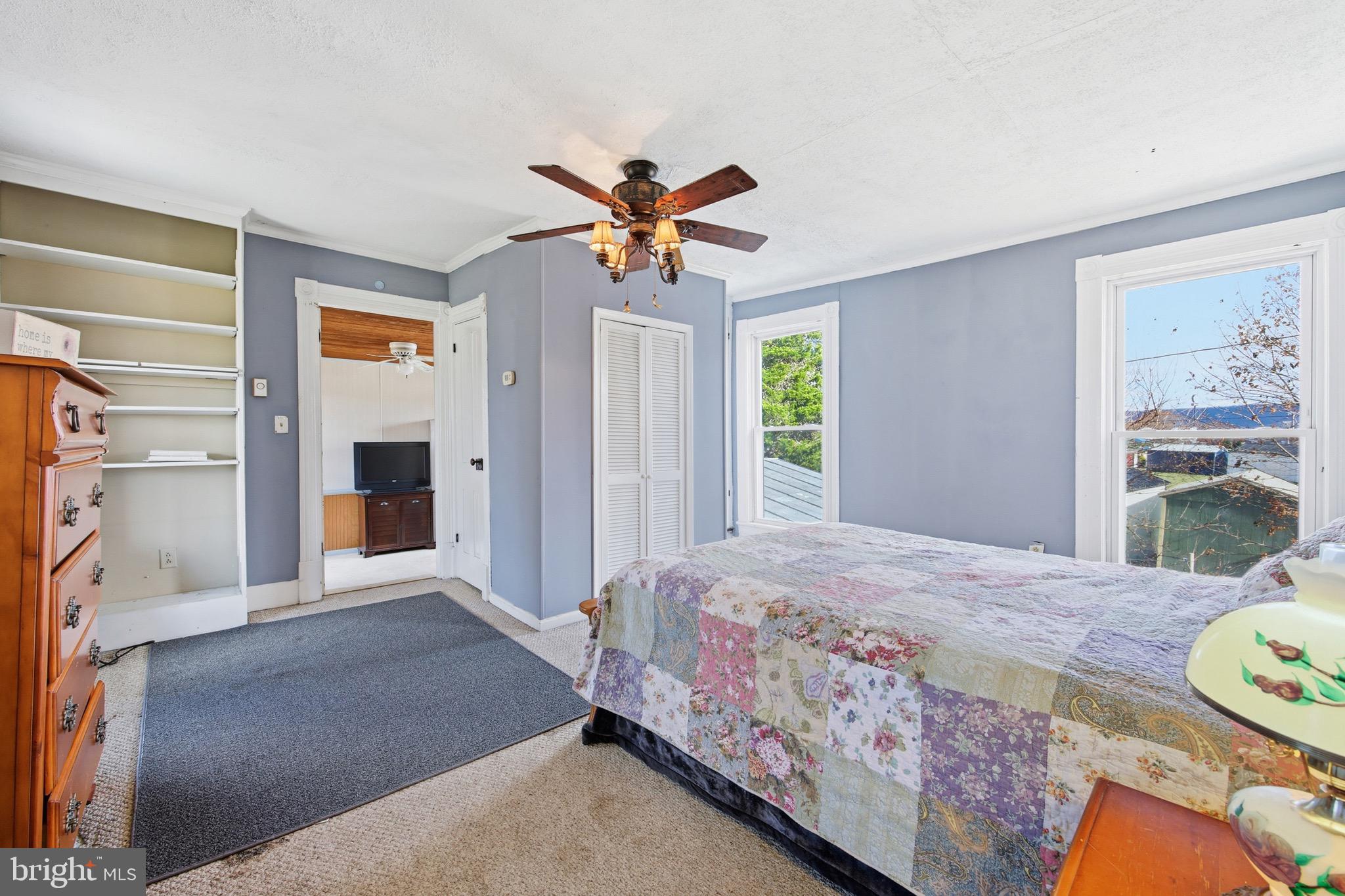 24295 Senedo Road Woodstock, VA 22664 - Photo 25 of 43 a bedroom with a bed and a window