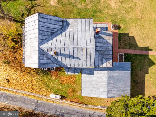 a view of a house with a street