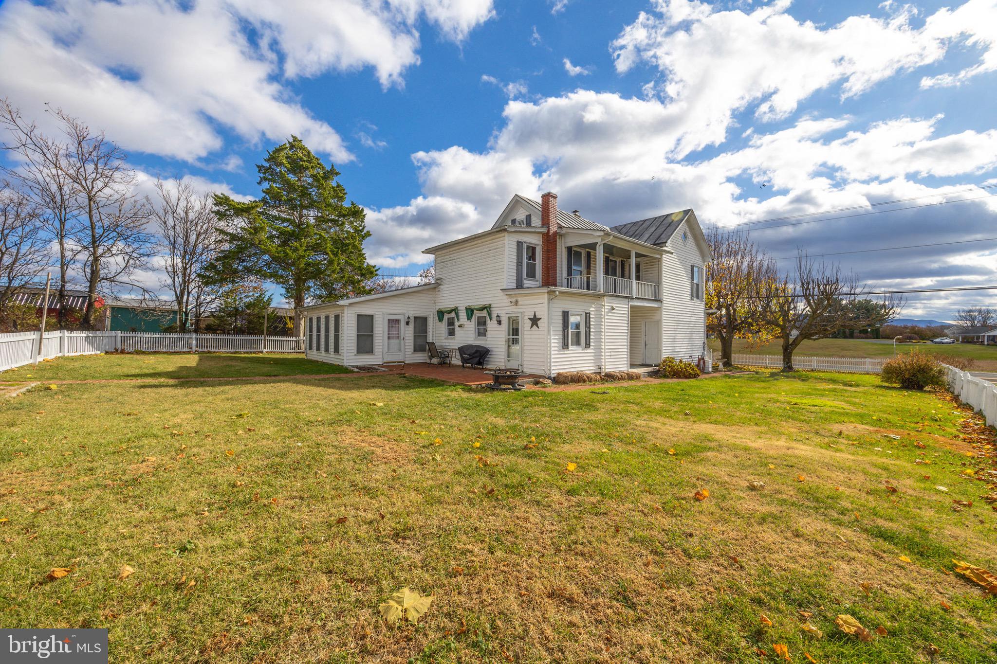 24295 Senedo Road Woodstock, VA 22664 - Photo 32 of 43 a view of a large pool with an outdoor space