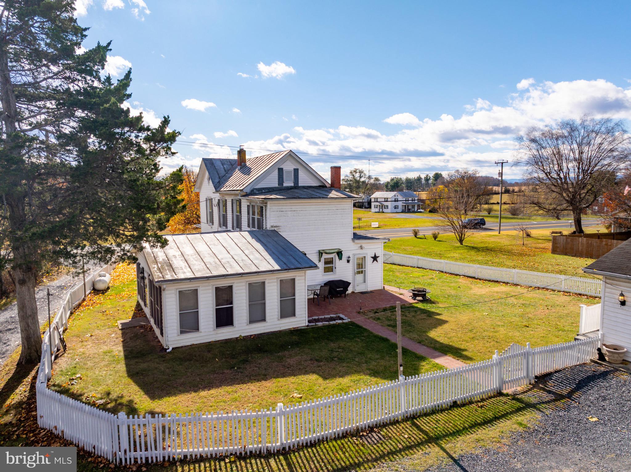 24295 Senedo Road Woodstock, VA 22664 - Photo 36 of 43 a view of a swimming pool with a lounge chairs