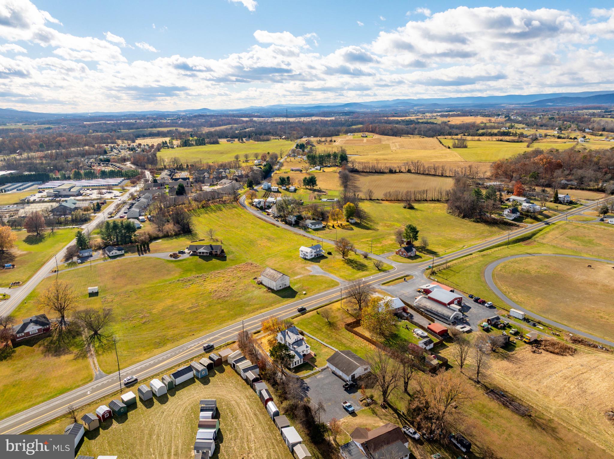 24295 Senedo Road Woodstock, VA 22664 - Photo 40 of 43 an aerial view of residential houses with outdoor space