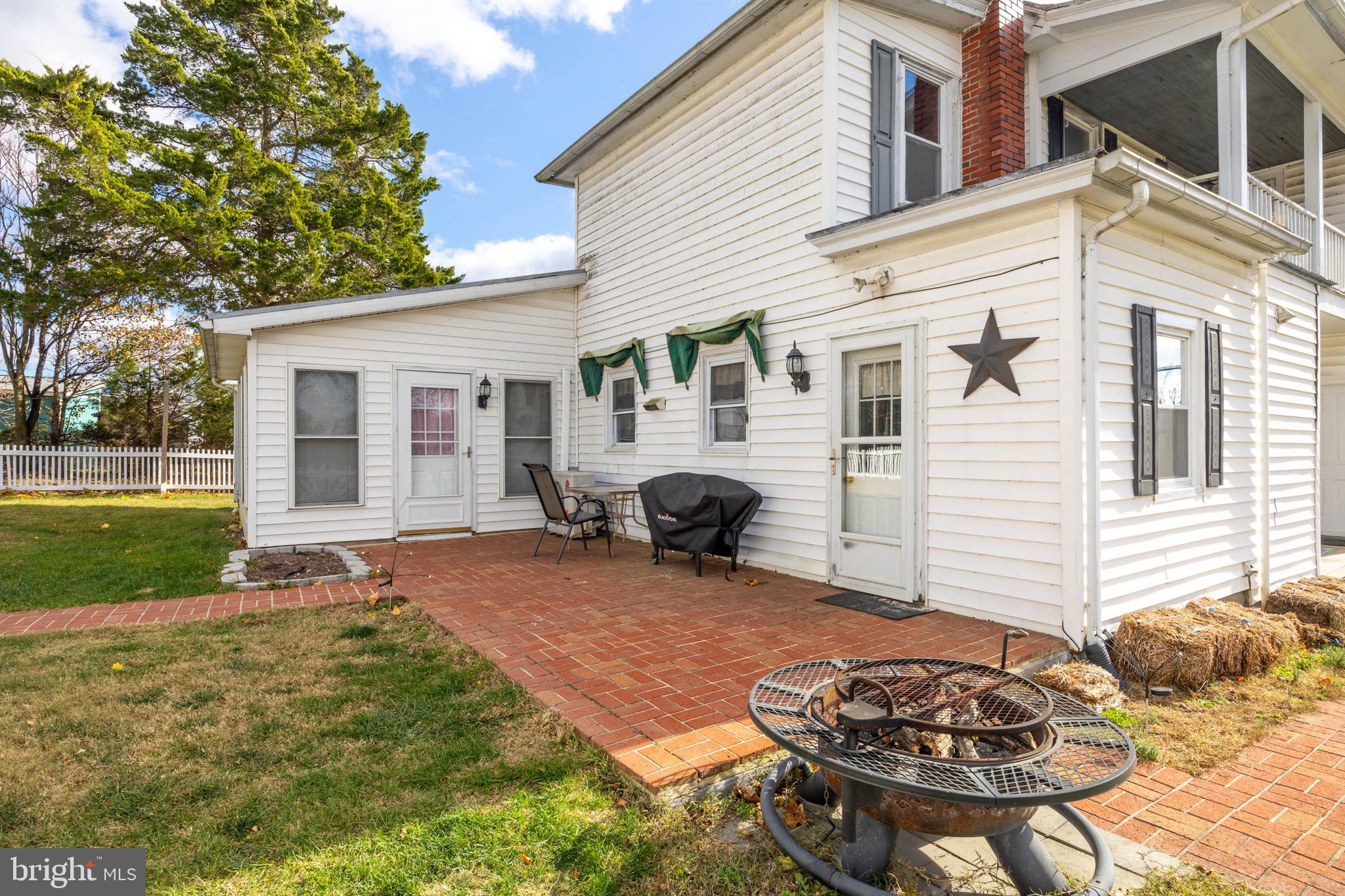 24295 Senedo Road Woodstock, VA 22664 - Photo 7 of 43 a view of a house with backyard and sitting area