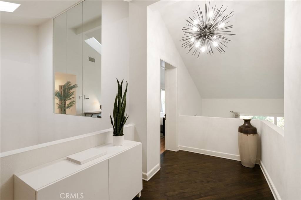 1447 North Kings Road West Hollywood, CA 90069 - Photo 15 of 40 a view of a hallway with workspace