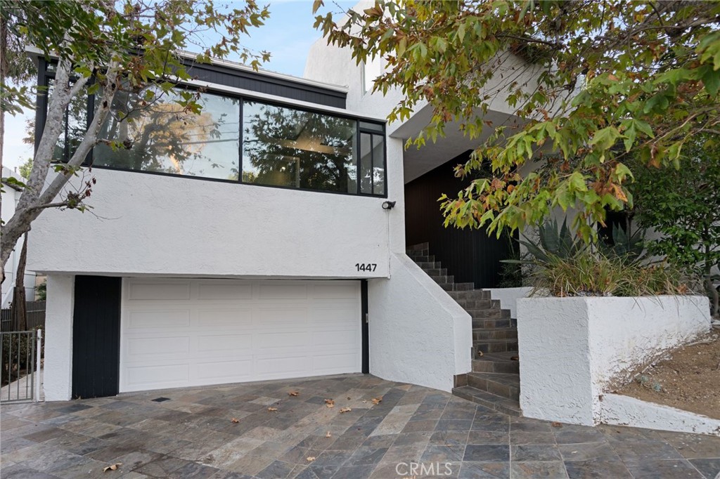 1447 North Kings Road West Hollywood, CA 90069 - Photo 40 of 40 a view of a house with a tree
