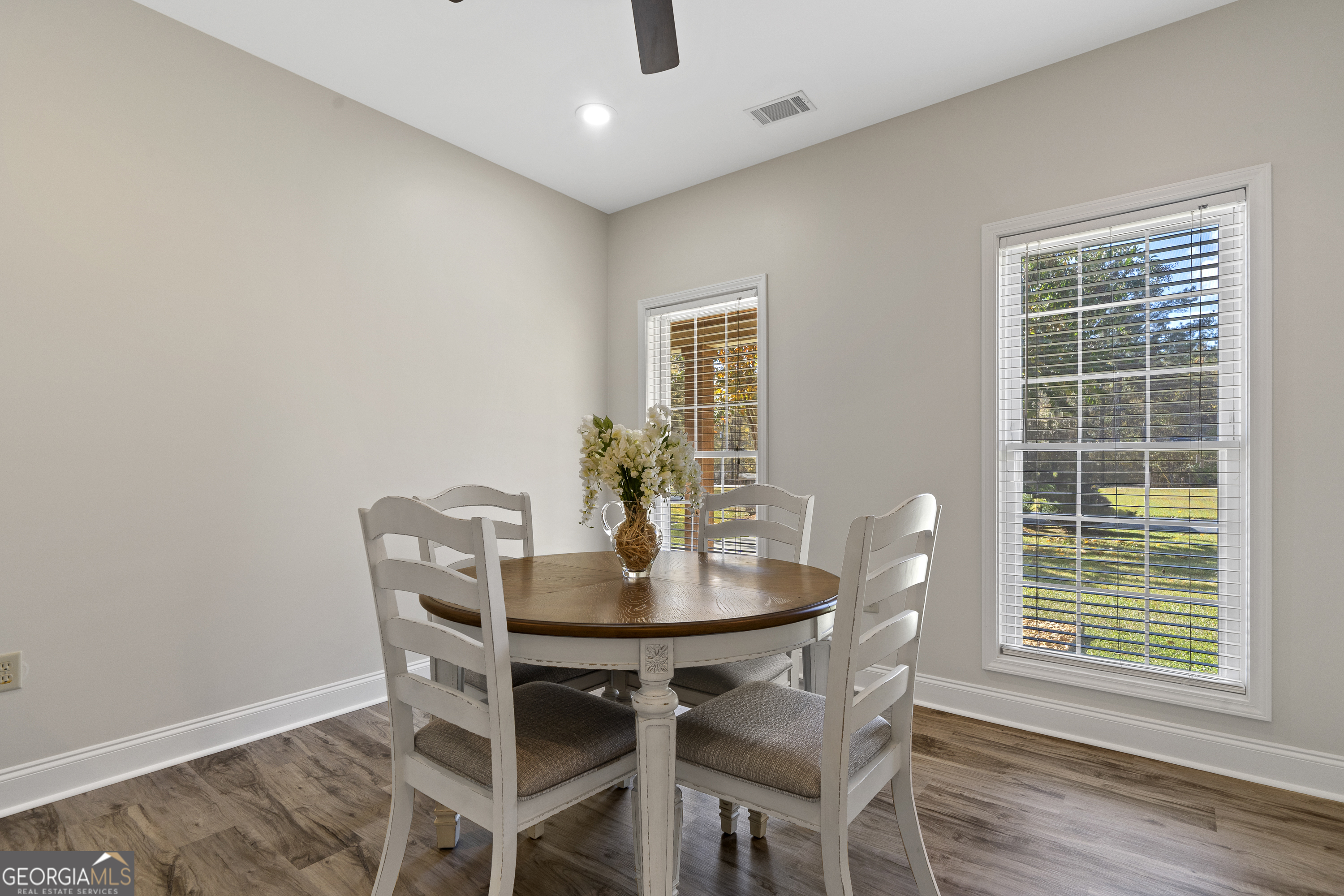 1050 Sugar Creek Church Road Madison, GA 30650 - Photo 16 of 60 a dining room with furniture and window