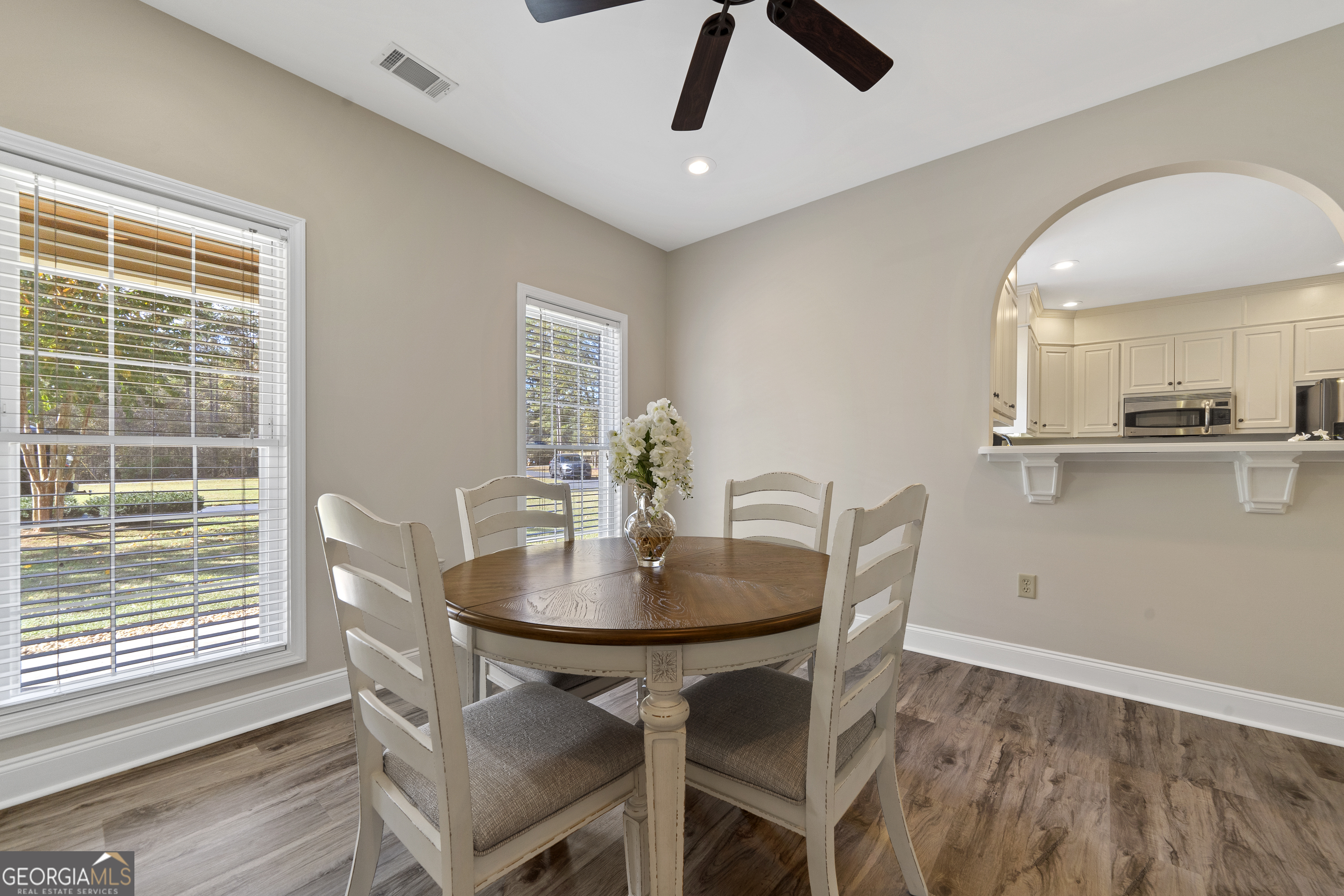 1050 Sugar Creek Church Road Madison, GA 30650 - Photo 17 of 60 a dining room with furniture and window