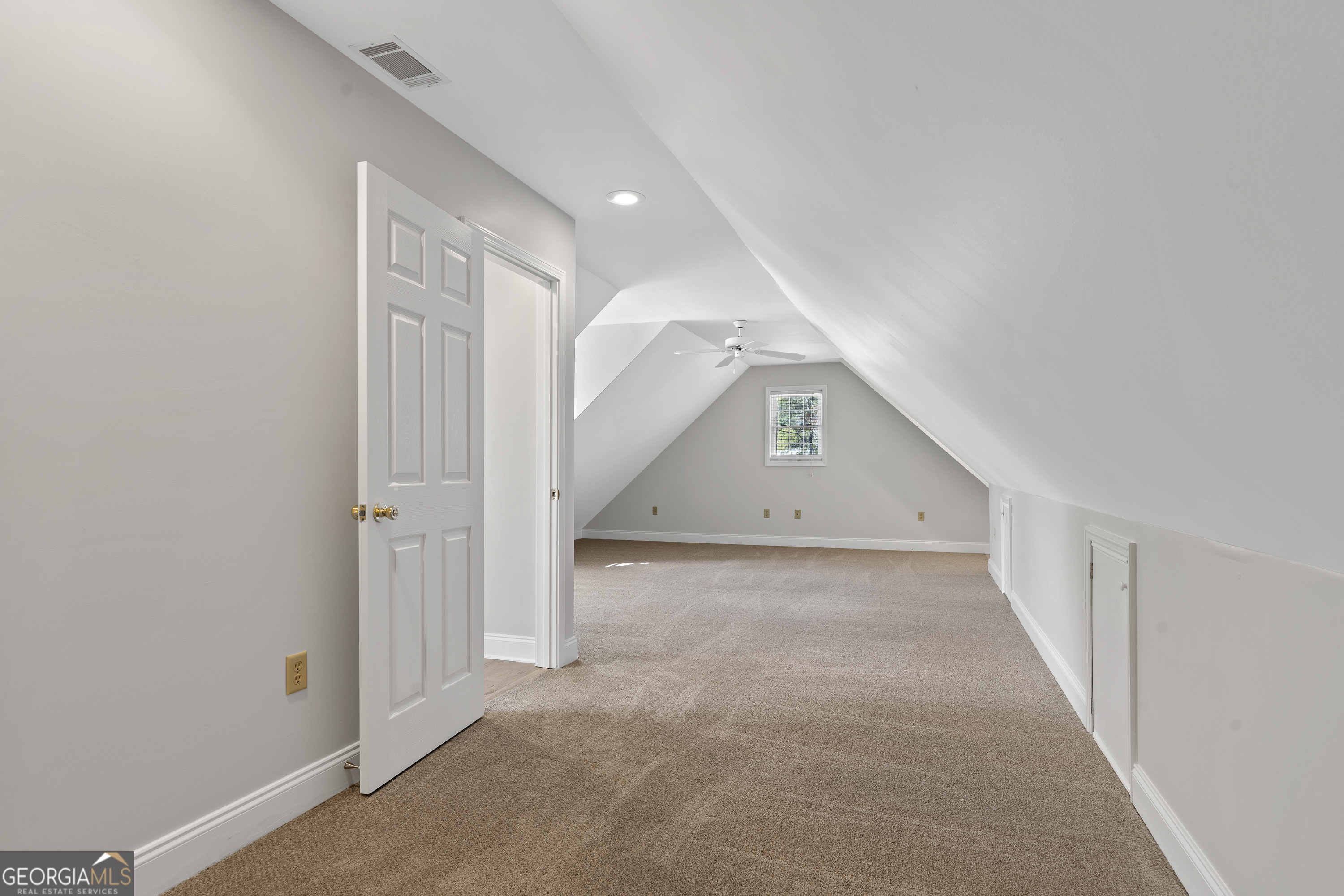 1050 Sugar Creek Church Road Madison, GA 30650 - Photo 45 of 60 a view of a hallway with staircase