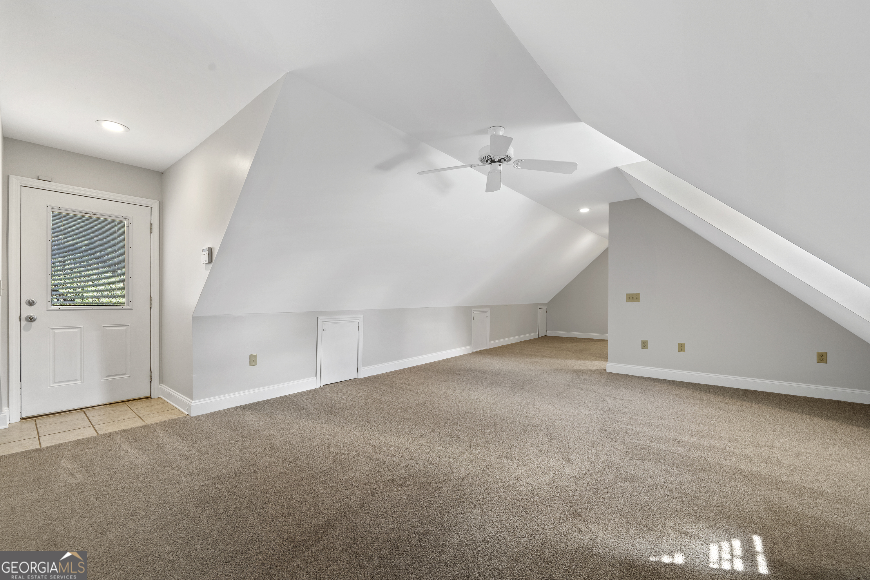 1050 Sugar Creek Church Road Madison, GA 30650 - Photo 47 of 60 a view of an empty room with a window