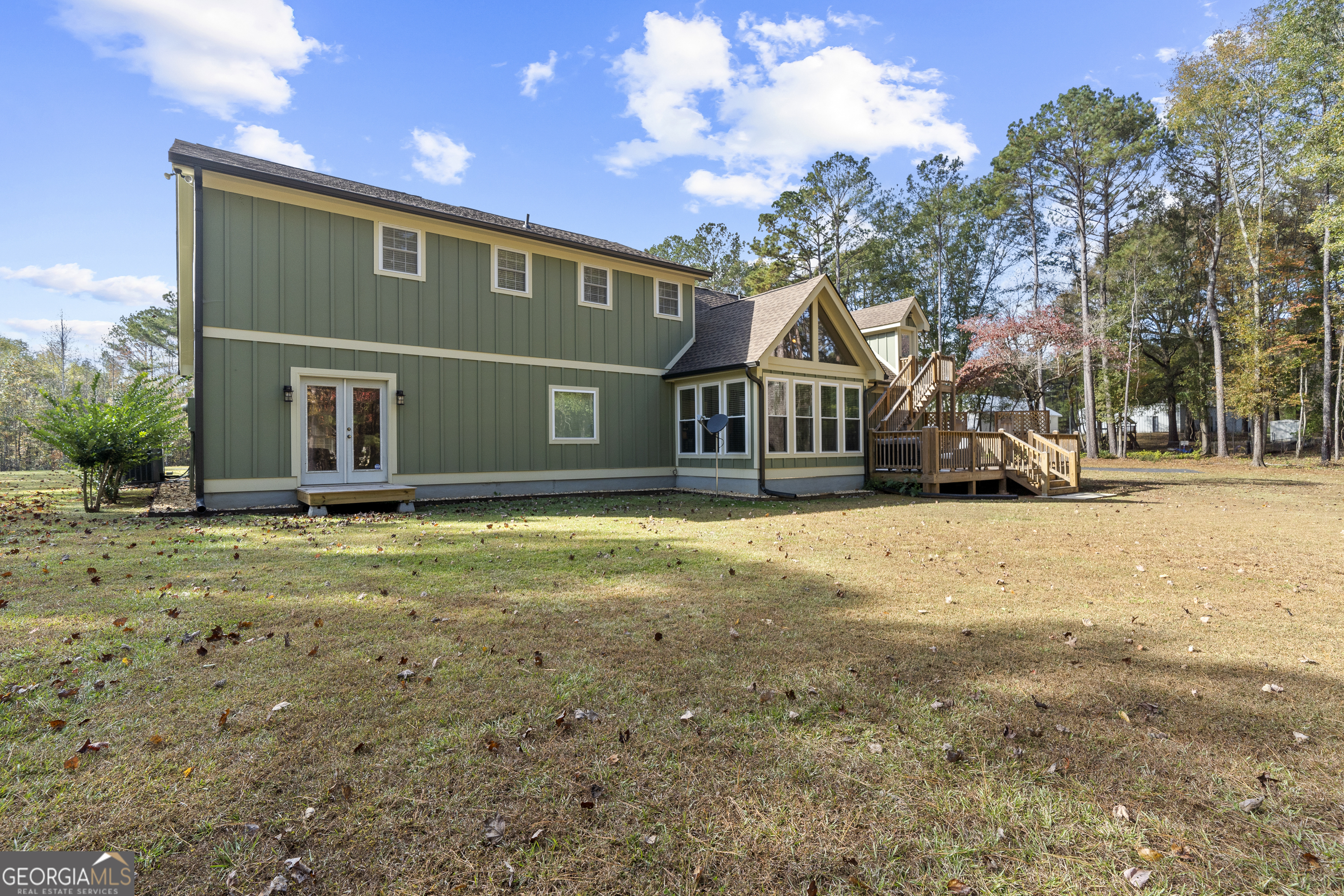 1050 Sugar Creek Church Road Madison, GA 30650 - Photo 59 of 60 a front view of a house with a yard
