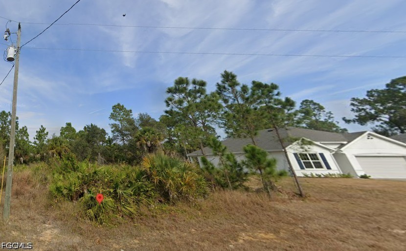 a house with trees in front of it