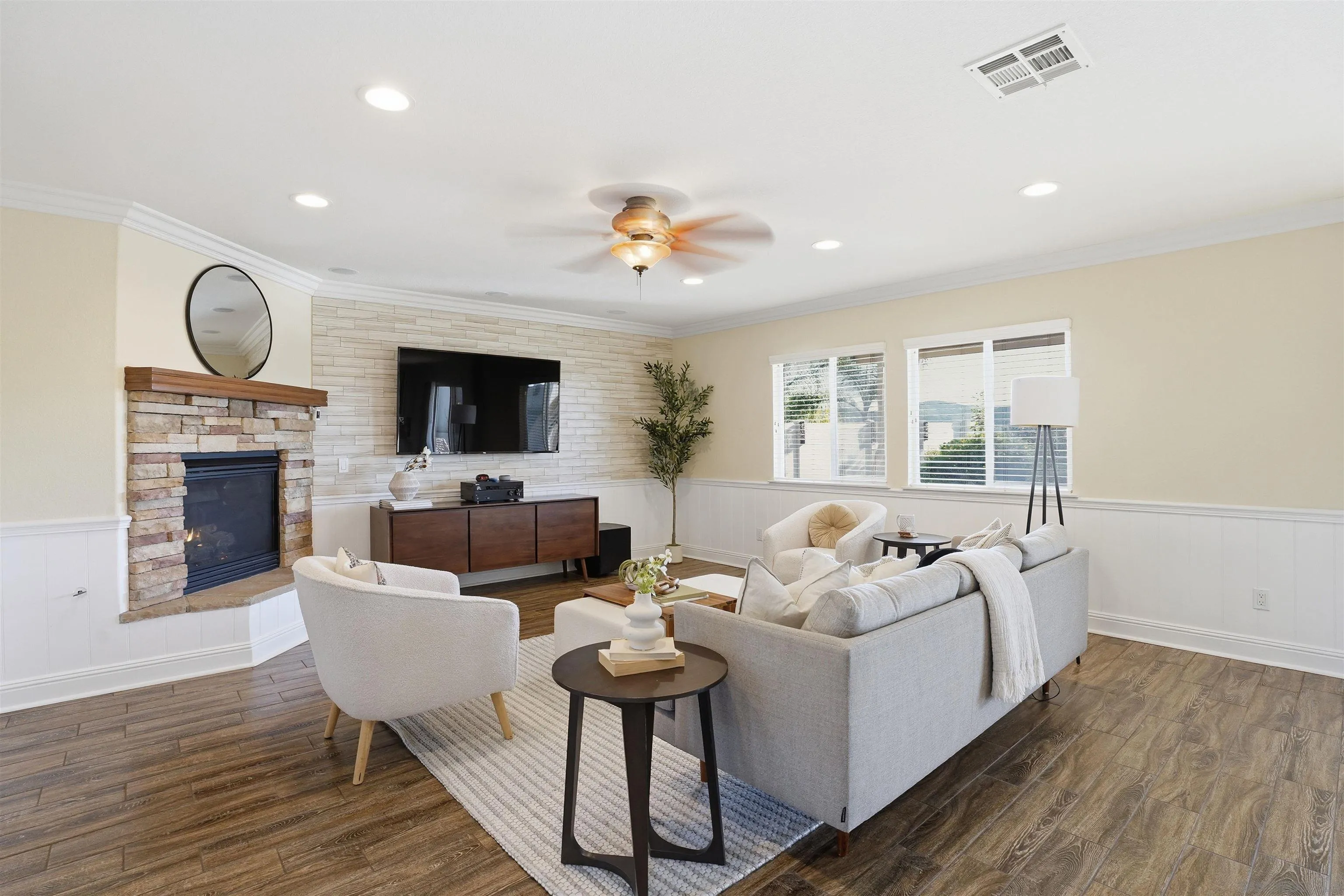 32892 Monte Drive Temecula, CA 92592 - Photo 11 of 60 a living room with furniture a fireplace and a flat screen tv