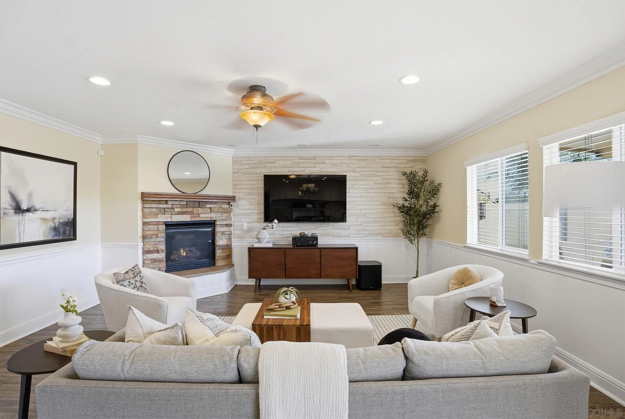 32892 Monte Drive Temecula, CA 92592 - Photo 13 of 60 a living room with furniture a fireplace and a flat screen tv