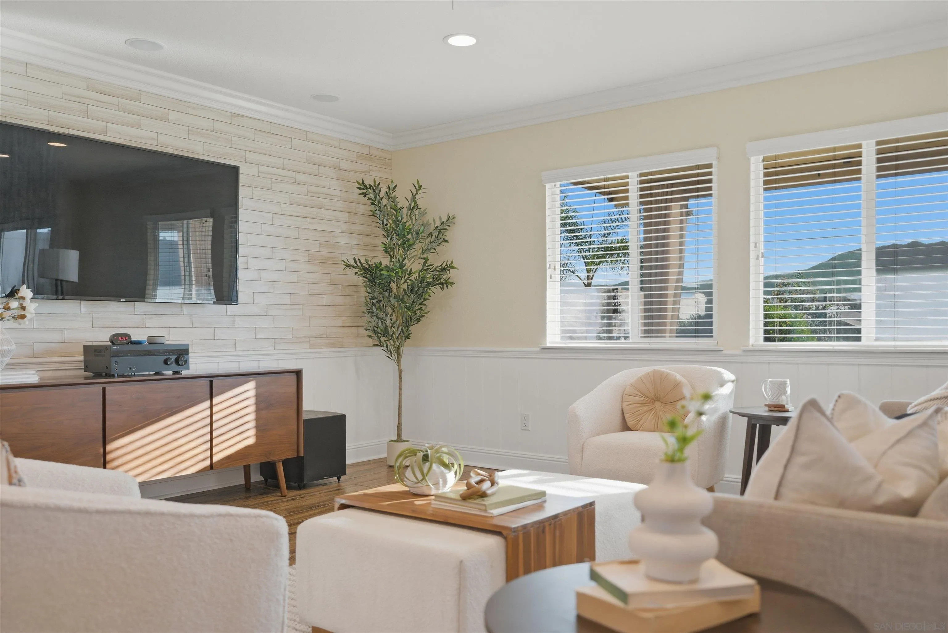 32892 Monte Drive Temecula, CA 92592 - Photo 15 of 60 a living room with furniture and a potted plant
