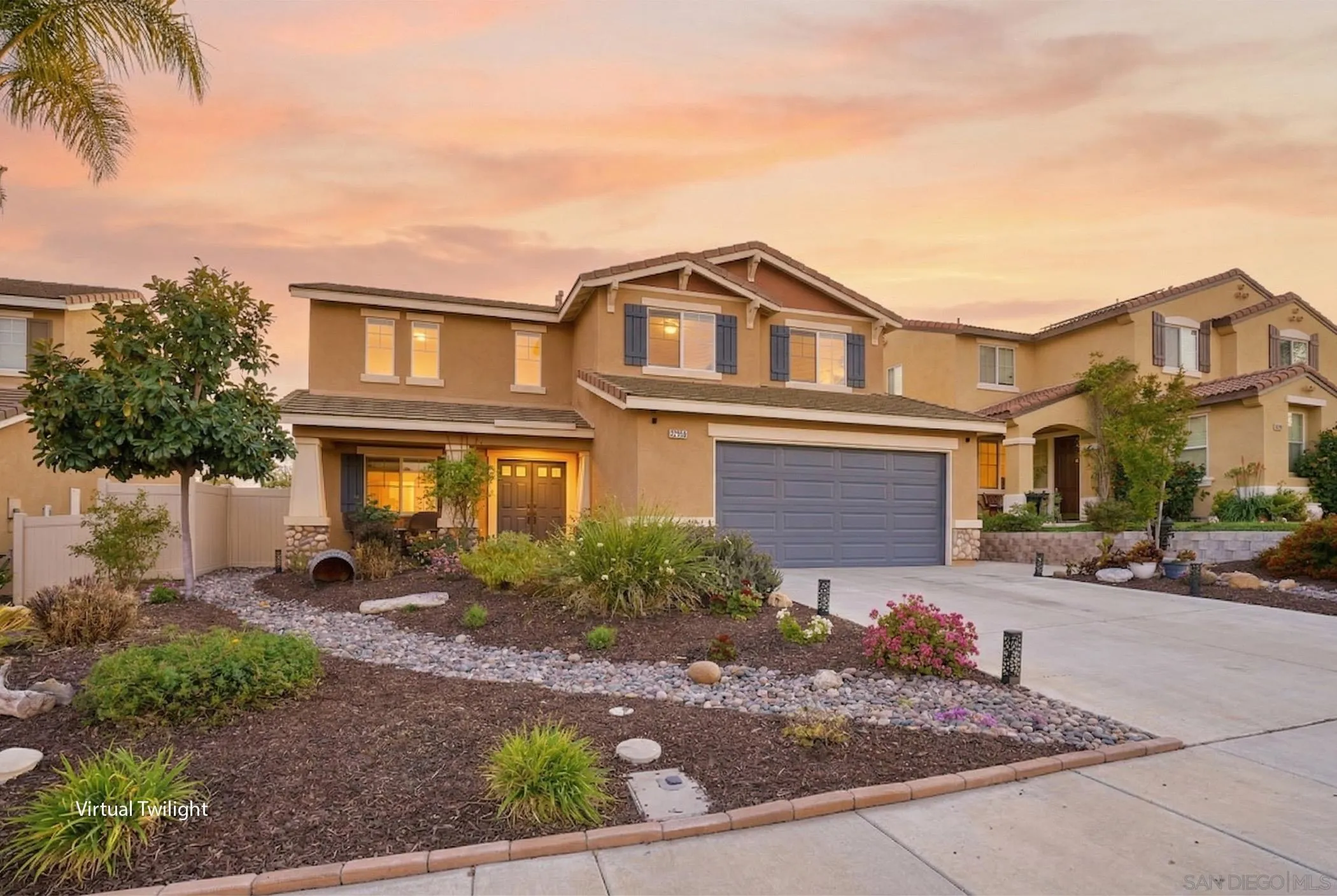 32892 Monte Drive Temecula, CA 92592 - Photo 2 of 60 a front view of a house with a yard and garage