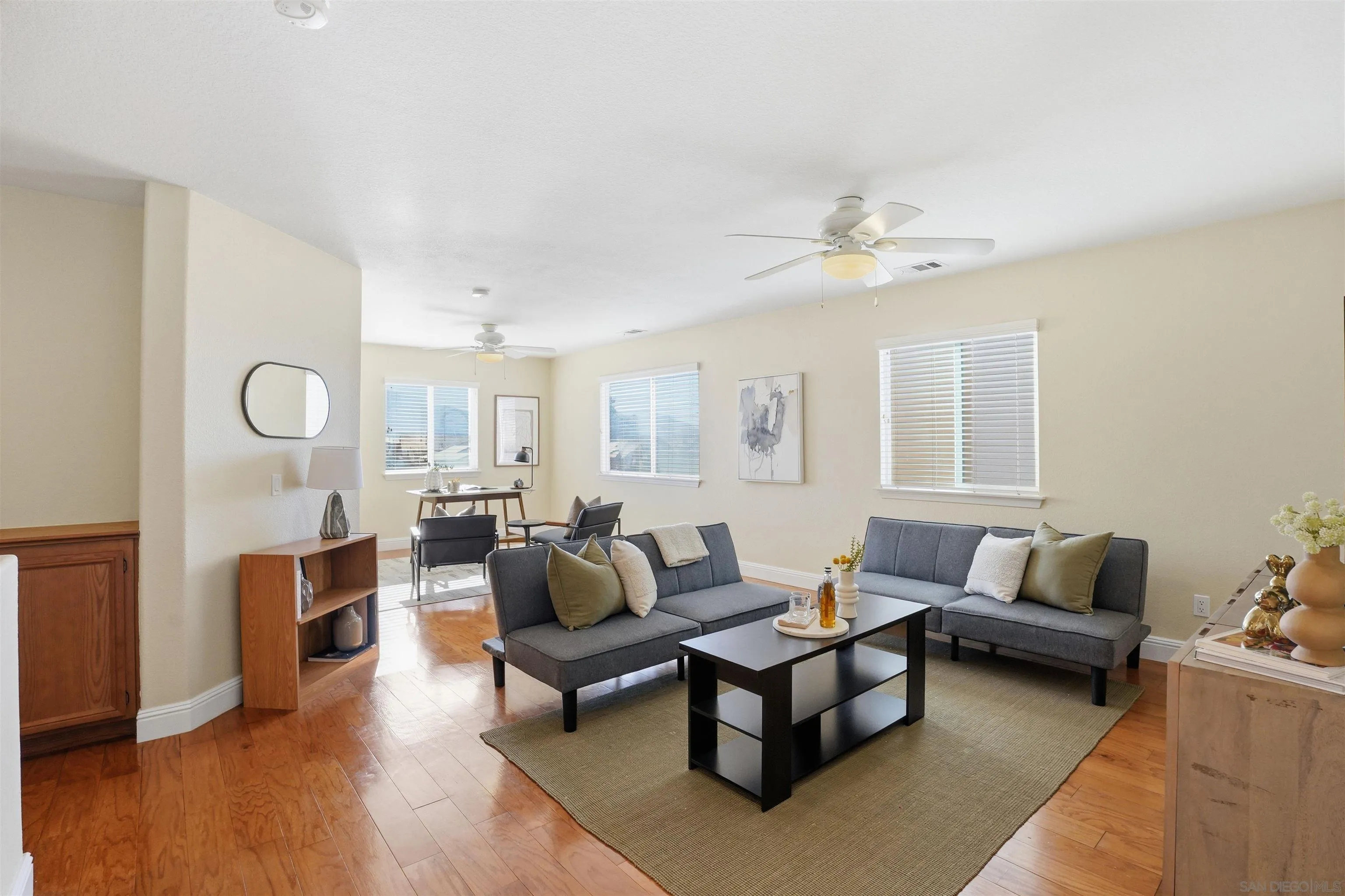 32892 Monte Drive Temecula, CA 92592 - Photo 26 of 60 a living room with furniture and a wooden floor