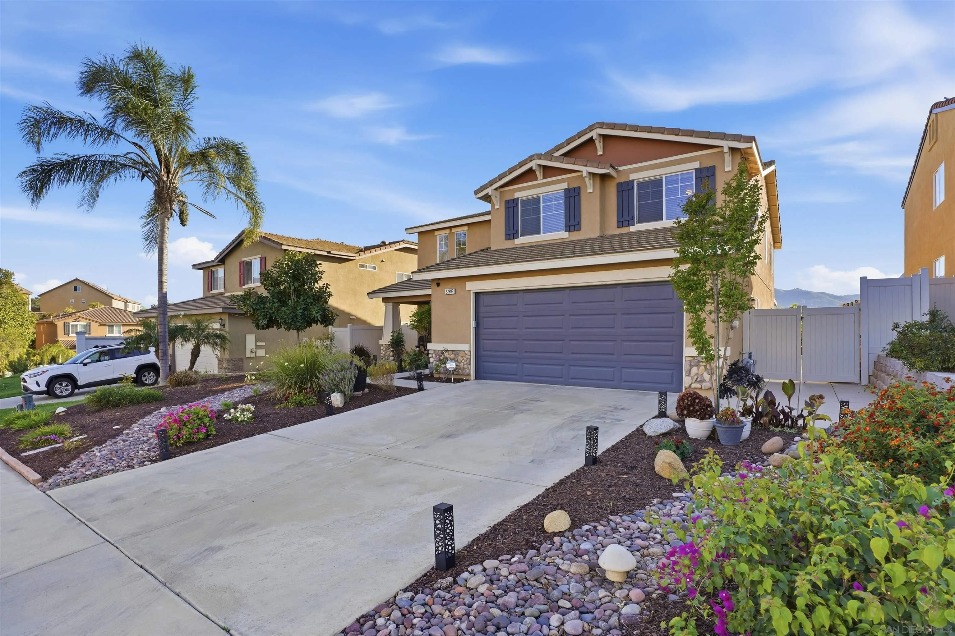 32892 Monte Drive Temecula, CA 92592 - Photo 45 of 60 a front view of a house with a yard